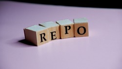 REPO rate concept on wooden blocks.