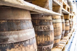 Stacked beer barrels - barrels of beer on the beer wagon