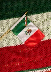 photo of a small Mexican fabric flag                      
