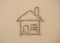 House painted on beach sand