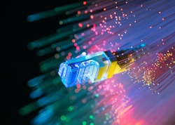 network cables closeup with fiber optical background