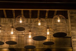 Birdcage lamps hanging on