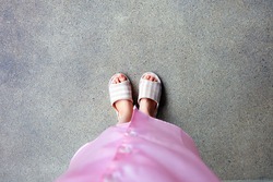 Pink Sleeping Suit and Slippers, Close Up of Woman’s Pink Checkered Slippers Standing on Floor Background Great for Any Use.
