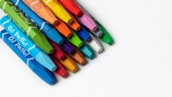 colored crayons with the inscription 