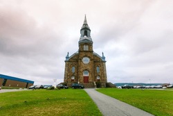 Église catholique Saint-Pierre Roman Catholic Church, Roman, a 120 year old roman catholic church located in Cheticamp, Cape Breton, Nova Scotia, Canada 