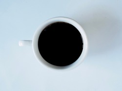 Front the top view, white coffee cup, filled with hot black coffee(americano), no sugar no milk, ready to drink, refreshing. aroma awake fresh to work placed on a white isolated background