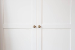 White closet doors wood closeup