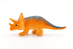 Triceratops toy model on white background