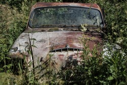 Forgotten scrap cars in the countryside