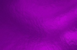 Purple foil background with uneven texture