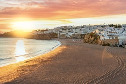 Panoramic view of Praia dos Pescadores in Albufeira at sunset, Algarve, Portugal - Travel landscape
