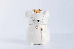 White porcelain rat princess in a golden crown