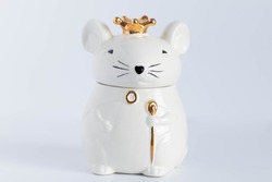 White porcelain rat princess in a golden crown
