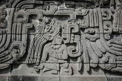 detail The Pyramid of the Feathered Serpents, mythological animals and pre-Hispanic frets 