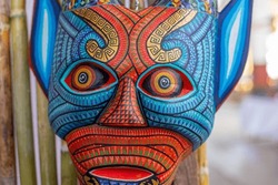 Alebrijes mask, colorful style and typical crafts from Oaxaca
