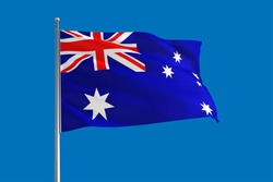 Australia national flag waving in the wind on a deep blue sky. High quality fabric. International relations concept.