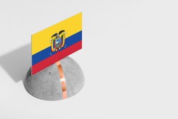 Ecuador flag tagged on rounded stone. White isolated background. Side view minimal national concept.