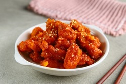 Yangnyeom chicken is a fried chicken dish prepared in a Korean style. Korean sweet and spicy fried chicken