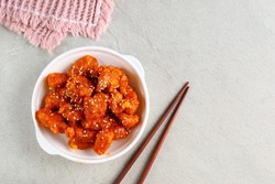 Yangnyeom chicken is a fried chicken dish prepared in a Korean style. Korean sweet and spicy fried chicken
