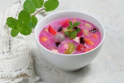 sop buah (es buah )-is an Indonesian iced fruit cocktail dessert. This cold and sweet beverage is made of diced fruits mixed with shaved ice or ice cubes, and sweetened with liquid sugar or syrup.