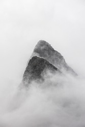 Mountain peaks in mist, Norway