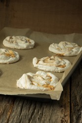 Miniature, salted caramel swirled pavlova just out of the oven.