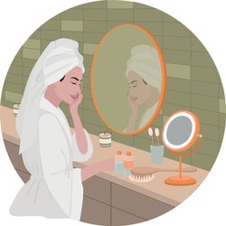 A young girl in the mirror is engaged in daily facial care