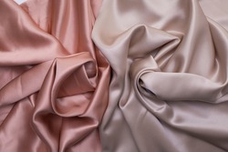 Silk bed sheets texture, pink silk fabric with decorative pleats