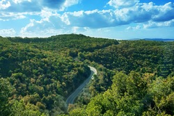 Aerial View of Mountain Road Through green Trees in Israel