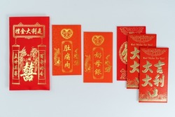 Various Red packet (Angpow) for Chinese pre-wedding gift ceremony (Guo Da Li). Red packet Chinese font translation “main gift, maternity gif, parental gift and some blessing word”. 