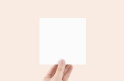 Blank Square Paper with hand mock up