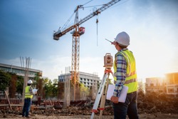 Surveyor equipment. Surveyor’s telescope at construction site or Surveying for making contour plans is a graphical representation of the lay of the land startup construction work.