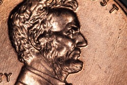 Macro shot of a US penny with Abe Lincoln