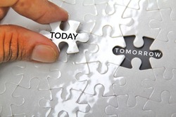 the concept of today and tomorrow with today's puzzle closes tomorrow. Selective focus.