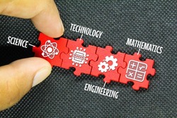 red puzzle connection with STEM icon. science, technology, engineering, mathematics education word with icons