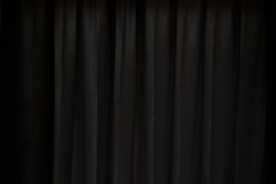 The background photo of dark grey color beautiful curtain in the dark modern design bed room