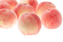 Photographed japanese ripe peach on white background