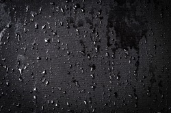 Water drops on wet cloth