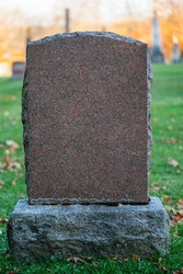 Blank granite tombstone headstone at a cemetery