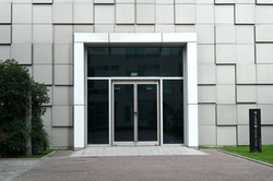 Glass door on the ground floor of commercial office building