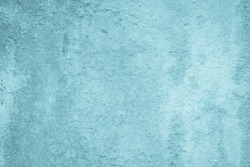 Blue crack concrete stone texture for background in summer wallpaper. Cement and sand wall of tone vintage. Concrete abstract wall of light blue dark color, cement texture background for design.