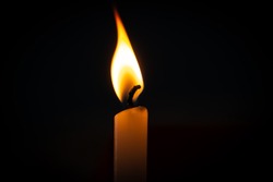 A candle with central focused and blurred outer area