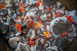 Close-up of a coals, barbecue grill with extinguished charcoal for barbecue or shish kebab. High quality photo