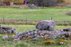 Iron age tomb site in rural part of Sweden. Stone boulders mark the graves locations