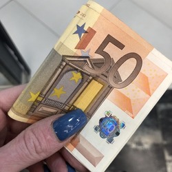 Macro photo euro currency bill. Stock photo euro money in hand