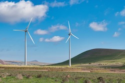 Landscape and renewable energy wind turbines on the island of Lanzarote, Canary Islands, Spain