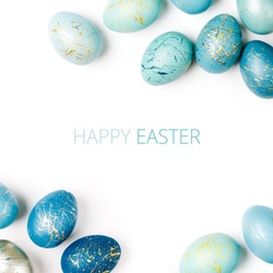 Happy Easter card. Frame  with gold and blue speckled easter eggs with copy space for text. isolated on white background