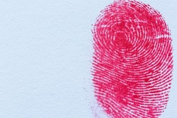red macro fingerprint,Bloody fingerprint as background, macro. Imprint of index finger,