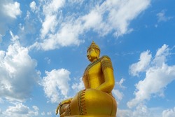 Golden buddha,Big Buddha statue outdoors,The giant golden Buddha. The large buddha statue with sunset or sunrise background. buddha statue sitting. Believe, Culture, Traditional. Buddhist believe conc