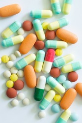Pills and capsules on a white background,Different colorful pills on white background